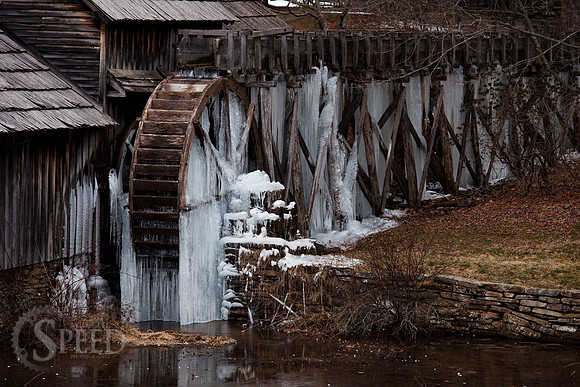 Icicles building on the strutcures below the flumes at Mabry Mill.