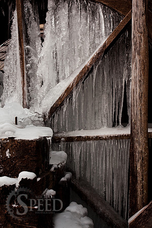 Icicles building on the strutcures below the flumes at Mabry Mill.