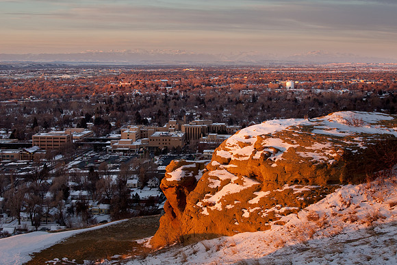 Early sunlight on the Rimrocks of Billings, overlooking the city of Billings and the Beartooth Mountains.