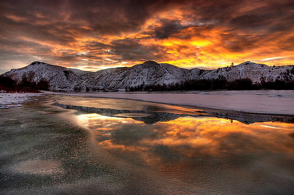 Fire-y Sunrise over an icey yellowstone river