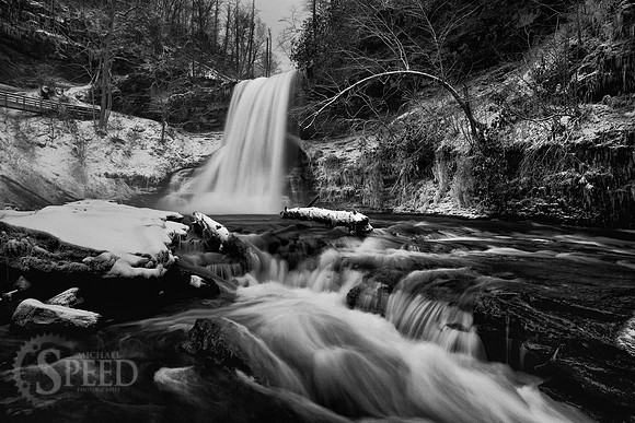 A black and white winter image of the Cascades waterfall near Pembroke, VA.